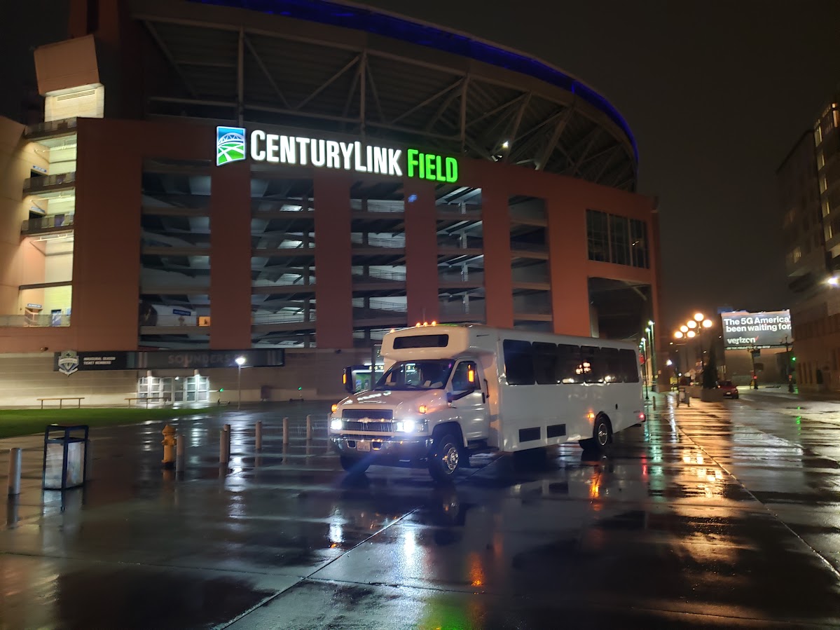 Seattle Party Limo party bus parked near Lumen Field for Seattle game day transportation